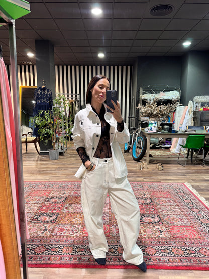 Pantalón blanco pespunte negro